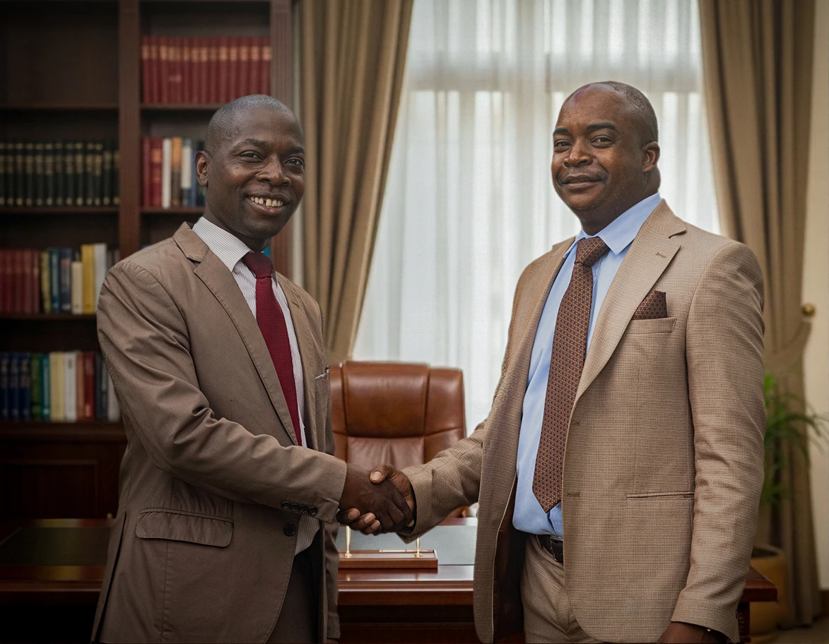 Malinga and Masango shaking hands